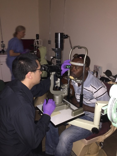 Dr. Lee examining a patient's retina